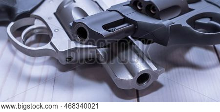 Two Snub Nose Revolvers, A Black 38 Special And A Stainless 357 Magnum, Both Loaded With Hollow Poin