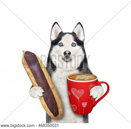 A Dog Husky Holds A Chocolate Eclair And A Cup Of Coffee. White Background. Isolated.