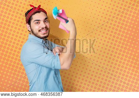 Happy Man Support Feminism Holding Cloth And Cleaning Brush, On Pop Background.