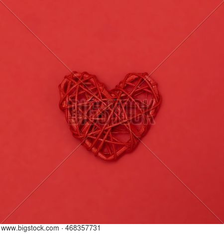 Valentines Day Red Rotang Heart On Same Color Background. Monochromatic Vivid Color. Eco Valentines 