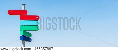 Blank Sign Post Against Blue Sky. Banner.