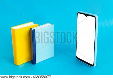 Isometric View Of Mobile Phone And Two Books On Light Blue Background. Distance Education.