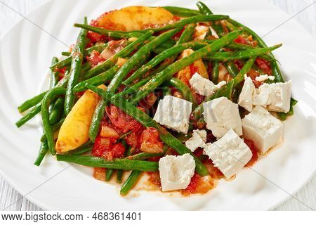 Close-up Of  Fasolakia Lathera, Green Beans, Onion And Potatoes Stewed In Tomato, Herbs And Olive Oi