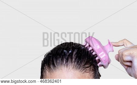 Hair Growth Stimulating, Scalp Massage.woman Use Massager Shampoo Brush