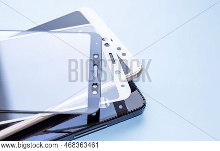 Maintenance And Repairing Smartphones. Many Tempered Glass Screen Protector