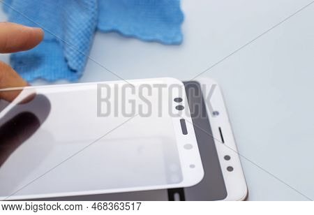 Maintenance And Repairing Smartphones. Many Tempered Glass Screen Protector