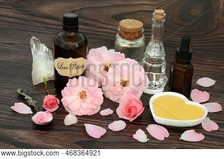 Valentines Day Love Potion Magic Spell Ingredients With Pink Rose Flowers, Honey, Quartz Crystals, O