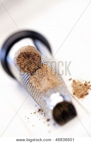 Powder And Nutmeg On A Grater