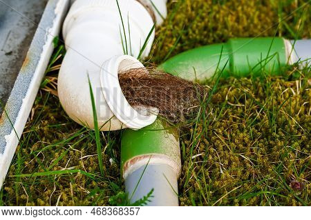 Old Plastic Water Pipes, Waste Clogged With Hair And Dirt
