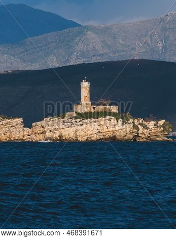 View Of Peristeres Kaparelli Light Lighthouse Beacon On An Island In The Ionian Sea, Greece, Seen Fr