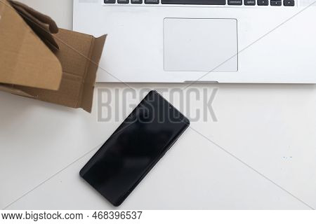 Shopping Online E-comerce, Parcel Boxes On A Laptop.