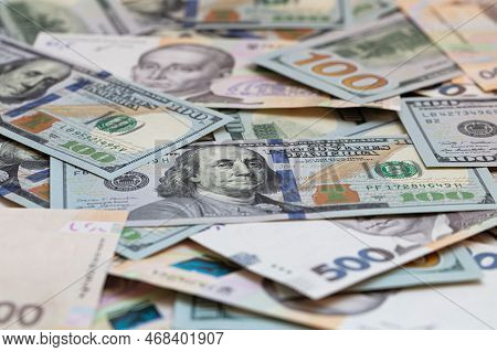 100 Dollar And  500 Hryvnyas Banknotes Background For Design Purpose