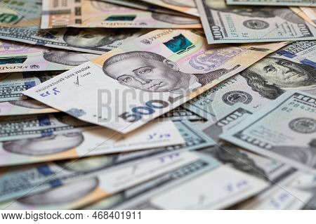 100 Dollar And  500 Hryvnyas Banknotes Background For Design Purpose