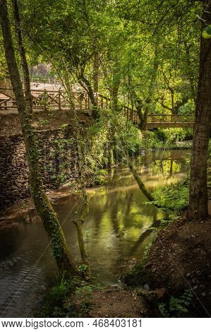 Surrounding Landscape Of The Estanislau Fountain Park And The Lourido River That Divides The Parishe