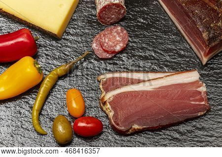 Overview Of South Tyrolean Speck On Black Slate