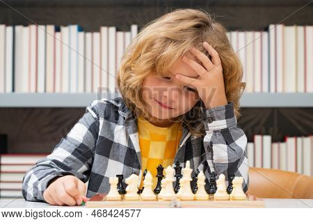 Clever Thinking Child. Chess For Intelligent Kid. Child Genius, Smart Pupil Playing Logic Board Game