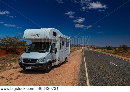 Outback, Australia - November 12, 2022: Motorhome Camper Van On Road Trip. People On Travel Vacation