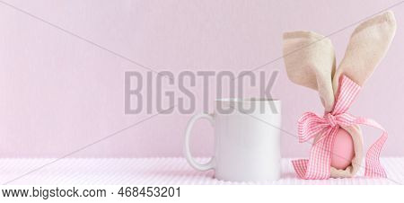 Easter Mockup White Coffee Mug With Rabbit Ears At Egg On Pink Cover Background., Copyspace.