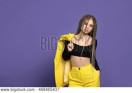 Beautiful Woman With Long African Braids On Purple Background, Space For Text