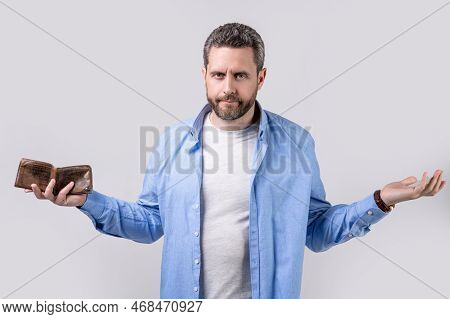Photo Of Shrugging Moneyless Man With Wallet. Moneyless Man With Wallet