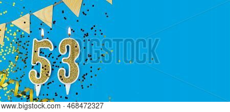 Golden Candle Number Fifty Three. Birthday Or Anniversary Card With The Inscription 53 On Blue Backg