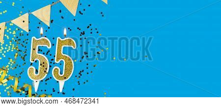 Golden Candle Number Fifty Five. Birthday Or Anniversary Card With The Inscription 55 On Blue Backgr