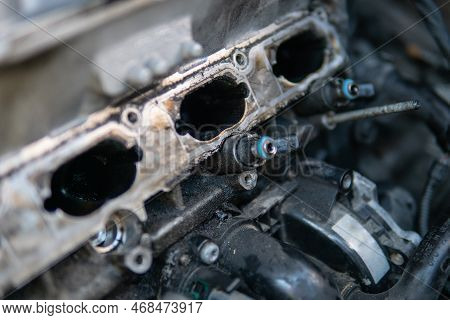 Car Engine Close Up Manifold Ports. Close Up Of Dirty Intake Manifold Ports. Engine Cleaning Process