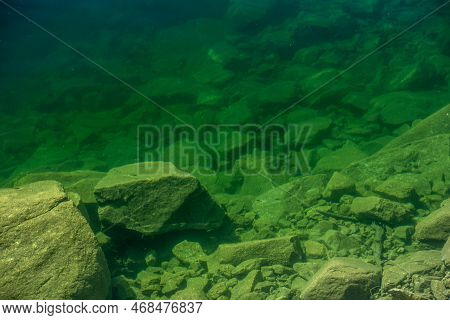Rocks In The Shallow Waters Of The Hetch Hetchy Dam In Yosemite