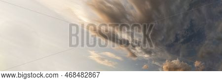 Banner Dramatic Dark Storm Clouds Black Sky Background. Dark Thunderstorm Clouds Rainny Season. Pano