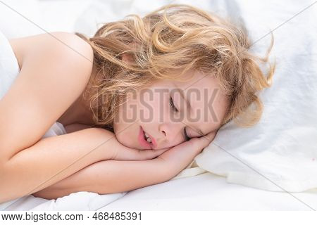 Sweet Sleep. Kid Take Nap. Child Sleeping In Bed, Comfortable Mattress On Bedroom. Healthy Sleeping 