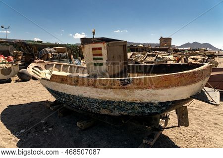 Cabo De Gata, Spain - September 04, 2020: Fishing Boats And Ships Stranded On The Beach Sand In The 