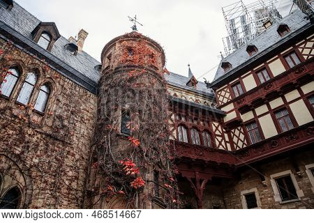 Wernigerode, Saxony-anhalt, Germany, 29 October 2022:  Castle With Tower In Harz Mountains Above Tow