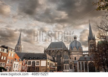 Aachen Cathedral Seen From The Old Town With Residential Buildings. Aachen Cathedral, Or Aachener Do
