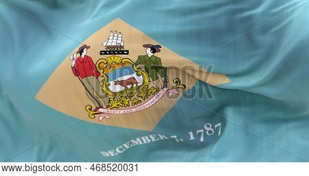 Close-up View Of The Delaware State Flag Waving. Delaware Is A State In The Mid-atlantic Region Of T