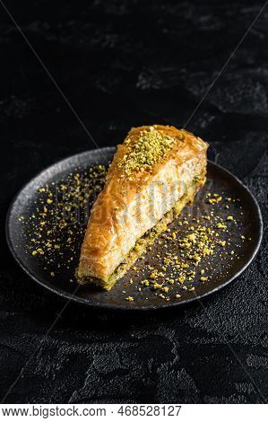 Turkish Havuc Dilim Baklava With Pistachio, Carrot Slice Baklava.  Black Background. Top View.
