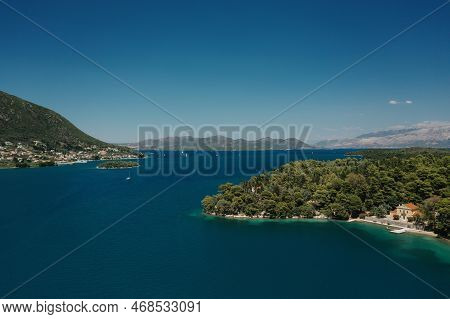 Popular Tourist Destination. Bay With Boats On Lefkada Island. Nydri Village.