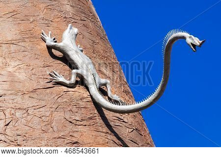 Florence, Tuscany, Italy - October 18, 2022: Sculpture Of A Lizard With Another Head On Its Tail. Th