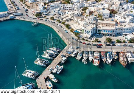 The Harbor Town Of Adamas Or Adamantas On The Island Of Milos. Cyclades Islands, Greece