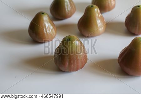 Freshly Rose Apple Or Chomphu Fruit On White Background. The Fruits Are Sweet And Red Or Green.