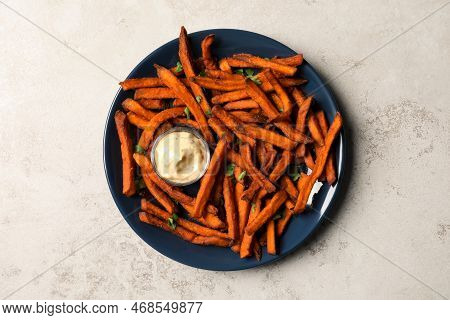 Delicious Sweet Potato Fries Served With Sauce On Light Table