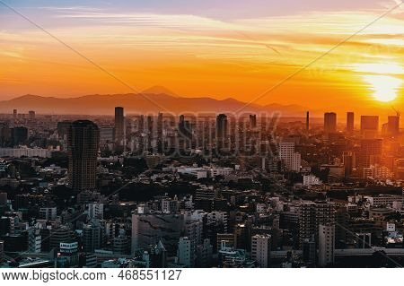 Aerial View Of The Skyline And Cityscape At Sunset In Minato, Tokyo, Japan