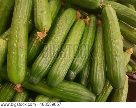 Fresh Cucumbers On The Counter In The Supermarke