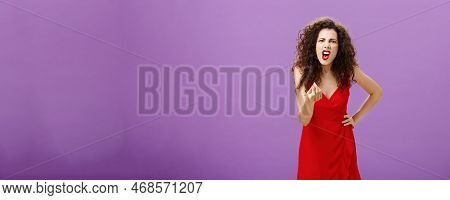 Woman In Fury Fighting With Husband Over Money Making Italian Gesture With Fingers Shouting And Yell