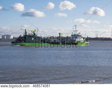 Doel, Belgium, 08 January 2023, The Trailing Suction Hopper Dredger Scheldt River Sails Here On The 