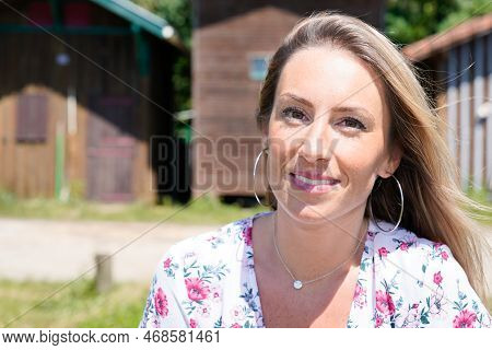 Pretty Blonde Smiling Woman Front Of Fisherman Wooden Hut Harbor In Arcachon Bay France