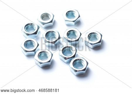 Mnay Iron Nuts Isolated On White Background