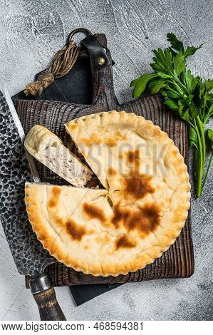 Sliced Kubdari, Tasty Georgian Flat Bread Stuffed With Meat. White Background. Top View.
