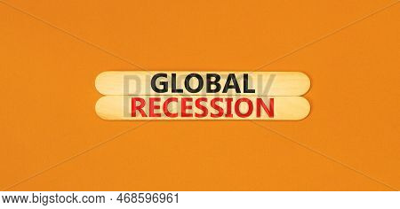 Global Recession Symbol. Concept Words Global Recession On Wooden Stick. Beautiful Orange Table Oran