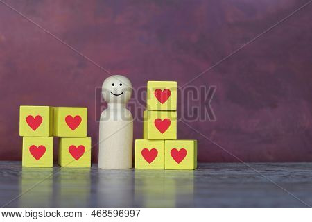 Wooden Doll And Heart Icon. Get A Lots Of Like, Popular, Likeable, Appealing And Charming Concept