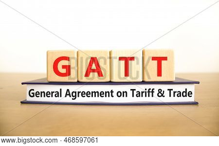 Gatt Symbol. Concept Words Gatt General Agreement On Tariff And Trade On Wooden Block On Beautiful W